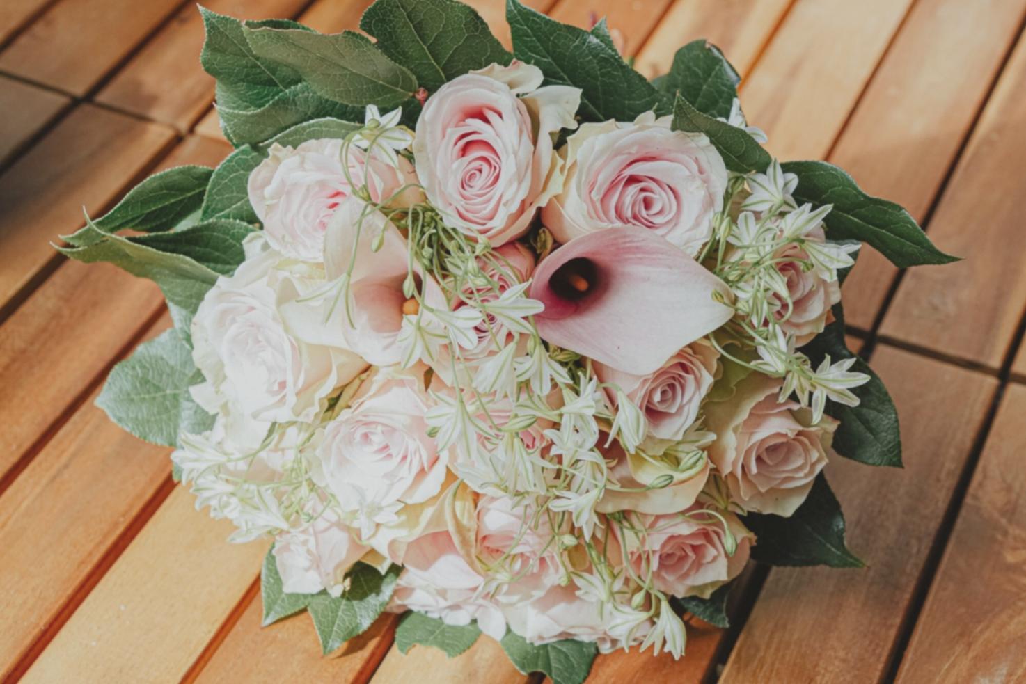 Professional floral design tools and materials in use